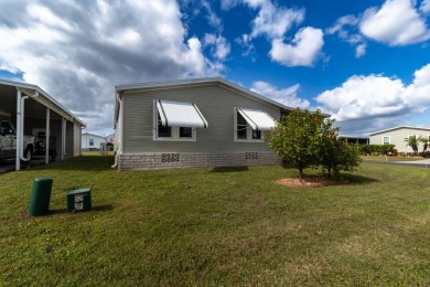 Welcome to this charming 2014 home in the peaceful Whispering on Lily Lake Golf and RV Resort in Florida - for sale on GolfHomes.com, golf home, golf lot