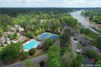 NESTLED IN THE DESIRABLE CARRIAGE RIDGE SECTION OF HARBOR CLUB on Harbor Club Golf and Country Club in Georgia - for sale on GolfHomes.com, golf home, golf lot