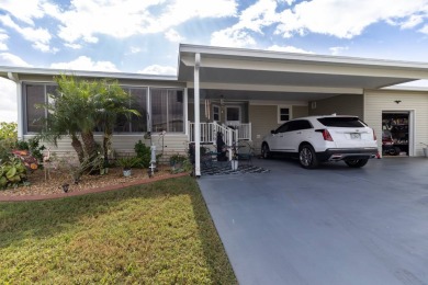 Welcome to this charming 2014 home in the peaceful Whispering on Lily Lake Golf and RV Resort in Florida - for sale on GolfHomes.com, golf home, golf lot