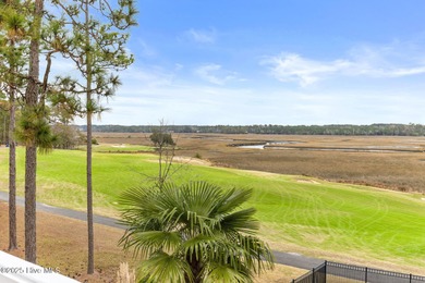 Where the Shallotte River bends and the 17th hole sweeps along on Rivers Edge Golf Club in North Carolina - for sale on GolfHomes.com, golf home, golf lot