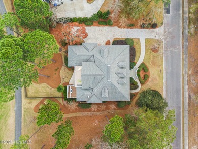 Where the Shallotte River bends and the 17th hole sweeps along on Rivers Edge Golf Club in North Carolina - for sale on GolfHomes.com, golf home, golf lot