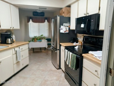 A condo unit 1 bedroom and 1Bathroom new flooring and granite on Stardust Golf Course in Arizona - for sale on GolfHomes.com, golf home, golf lot