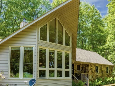 Welcome to 'Pine Bend', a stunning, custom-built CHALET inside on Alpine Lake Resort in West Virginia - for sale on GolfHomes.com, golf home, golf lot