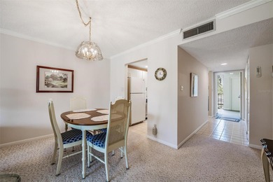 Tucked inside the ever-popular 3400 building of Village 4 in on Cove Cay Country Club in Florida - for sale on GolfHomes.com, golf home, golf lot