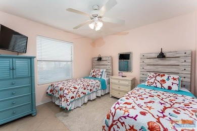 Selling fully furnished and truly turn-key, this stylish coastal on South Padre Island Golf Club in Texas - for sale on GolfHomes.com, golf home, golf lot