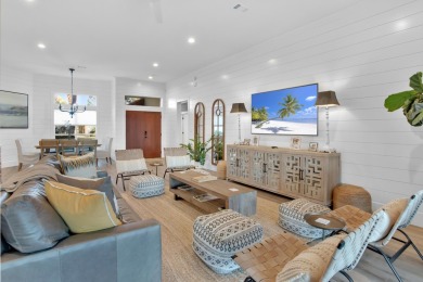 Completely transformed and renovated in 2019, this single-story on Regatta Bay Golf and Country Club in Florida - for sale on GolfHomes.com, golf home, golf lot