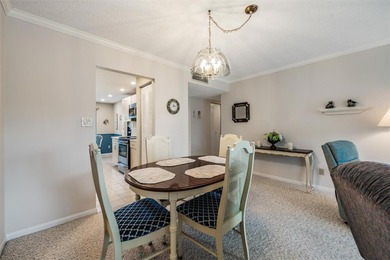 Tucked inside the ever-popular 3400 building of Village 4 in on Cove Cay Country Club in Florida - for sale on GolfHomes.com, golf home, golf lot