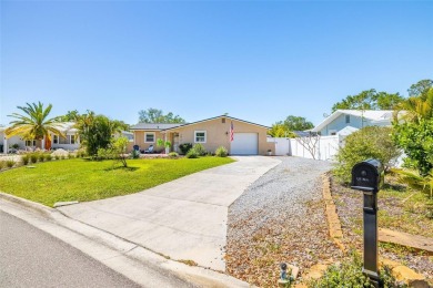 Welcome to effortless Florida living in this beautifully on The Dunedin Country Club in Florida - for sale on GolfHomes.com, golf home, golf lot