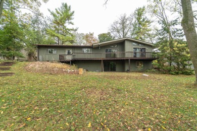 Experience the perfect blend of timeless design and modern on Ann Arbor Country Club in Michigan - for sale on GolfHomes.com, golf home, golf lot