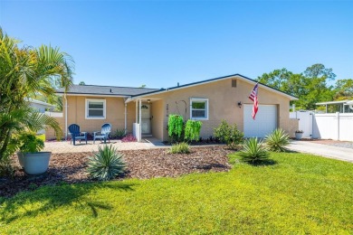 Welcome to effortless Florida living in this beautifully on The Dunedin Country Club in Florida - for sale on GolfHomes.com, golf home, golf lot