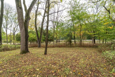 Experience the perfect blend of timeless design and modern on Ann Arbor Country Club in Michigan - for sale on GolfHomes.com, golf home, golf lot