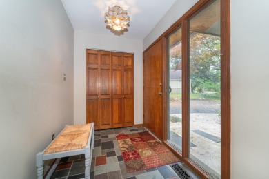 Experience the perfect blend of timeless design and modern on Ann Arbor Country Club in Michigan - for sale on GolfHomes.com, golf home, golf lot