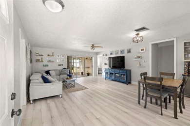 Welcome to effortless Florida living in this beautifully on The Dunedin Country Club in Florida - for sale on GolfHomes.com, golf home, golf lot