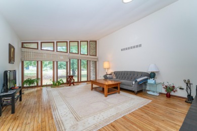 Experience the perfect blend of timeless design and modern on Ann Arbor Country Club in Michigan - for sale on GolfHomes.com, golf home, golf lot