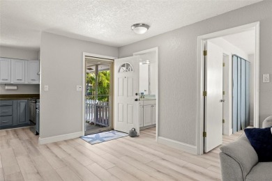 Welcome to effortless Florida living in this beautifully on The Dunedin Country Club in Florida - for sale on GolfHomes.com, golf home, golf lot