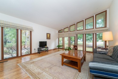 Experience the perfect blend of timeless design and modern on Ann Arbor Country Club in Michigan - for sale on GolfHomes.com, golf home, golf lot