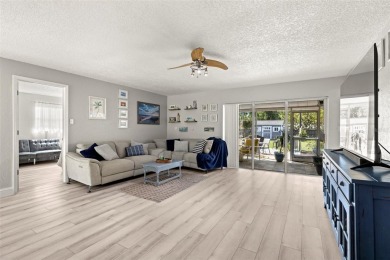 Welcome to effortless Florida living in this beautifully on The Dunedin Country Club in Florida - for sale on GolfHomes.com, golf home, golf lot