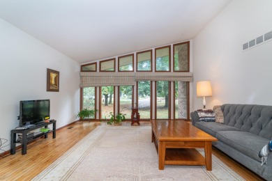 Experience the perfect blend of timeless design and modern on Ann Arbor Country Club in Michigan - for sale on GolfHomes.com, golf home, golf lot