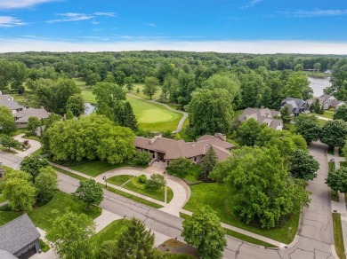 Presenting one of the most architecturally significant homes in on Watermark Country Club in Michigan - for sale on GolfHomes.com, golf home, golf lot
