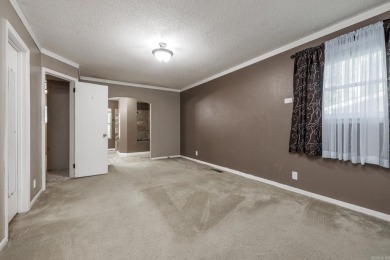 Don't miss this one!  Large living room with picture window and on Cortez Golf Course in Arkansas - for sale on GolfHomes.com, golf home, golf lot