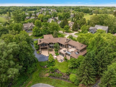 Presenting one of the most architecturally significant homes in on Watermark Country Club in Michigan - for sale on GolfHomes.com, golf home, golf lot