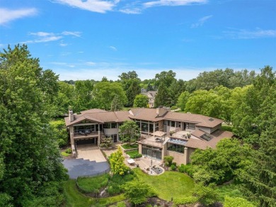 Presenting one of the most architecturally significant homes in on Watermark Country Club in Michigan - for sale on GolfHomes.com, golf home, golf lot
