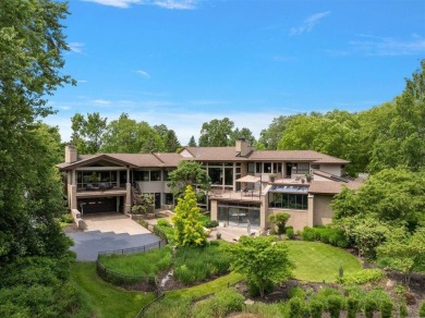 Presenting one of the most architecturally significant homes in on Watermark Country Club in Michigan - for sale on GolfHomes.com, golf home, golf lot