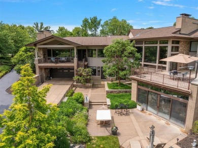 Presenting one of the most architecturally significant homes in on Watermark Country Club in Michigan - for sale on GolfHomes.com, golf home, golf lot