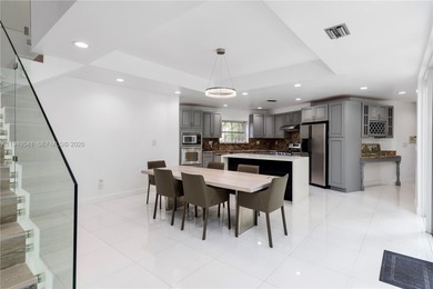 This stunning two-story, corner-lot home offers an unbeatable on Granada Golf Club in Florida - for sale on GolfHomes.com, golf home, golf lot