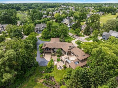 Presenting one of the most architecturally significant homes in on Watermark Country Club in Michigan - for sale on GolfHomes.com, golf home, golf lot