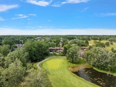 Presenting one of the most architecturally significant homes in on Watermark Country Club in Michigan - for sale on GolfHomes.com, golf home, golf lot