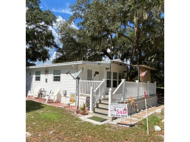 This beautiful park model home has been totally updated with new on Clerbrook Resort, Inc. in Florida - for sale on GolfHomes.com, golf home, golf lot