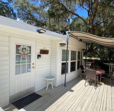 This beautiful park model home has been totally updated with new on Clerbrook Resort, Inc. in Florida - for sale on GolfHomes.com, golf home, golf lot