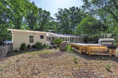 Don't miss this one!  Large living room with picture window and on Cortez Golf Course in Arkansas - for sale on GolfHomes.com, golf home, golf lot