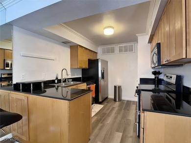 Wake up to lush green fairway views and the quiet elegance of on Las Vegas Country Club in Nevada - for sale on GolfHomes.com, golf home, golf lot