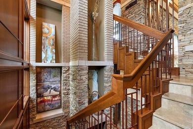 Presenting one of the most architecturally significant homes in on Watermark Country Club in Michigan - for sale on GolfHomes.com, golf home, golf lot