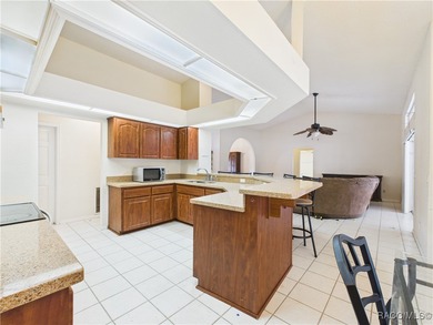 Charming 3-bedroom, 2-bathroom pool home nestled in the serene on Sugarmill Woods Golf and Country Club in Florida - for sale on GolfHomes.com, golf home, golf lot