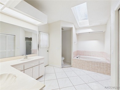 Charming 3-bedroom, 2-bathroom pool home nestled in the serene on Sugarmill Woods Golf and Country Club in Florida - for sale on GolfHomes.com, golf home, golf lot