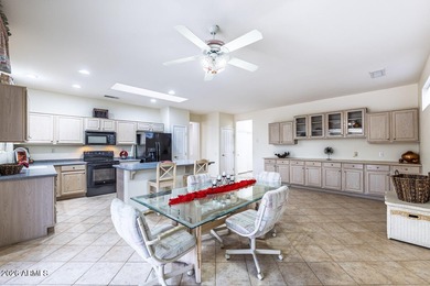 Fantastic Verbena model has a large eat-in kitchen with loads of on Granite Falls Golf Club  in Arizona - for sale on GolfHomes.com, golf home, golf lot