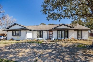 Updated home with an open modern concept on the 9th fairway of on Brookhaven Country Club - Golf Course in Texas - for sale on GolfHomes.com, golf home, golf lot