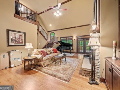 This European-style home offers an array of luxurious features on Royal Lakes Golf and Country Club in Georgia - for sale on GolfHomes.com, golf home, golf lot