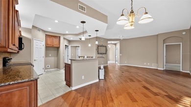 Discover this beautifully maintained 3-bedroom, 2-bath condo on Twin Isles Country Club in Florida - for sale on GolfHomes.com, golf home, golf lot