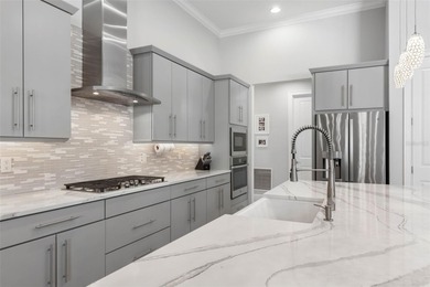 Welcome to an exceptional coastal estate in the private on Grand Haven Golf Club in Florida - for sale on GolfHomes.com, golf home, golf lot