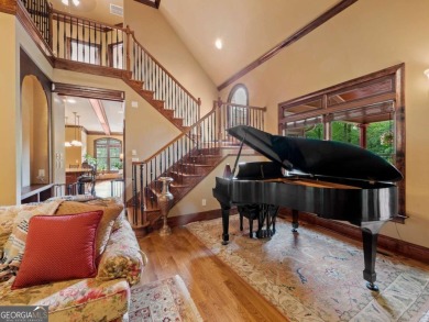 This European-style home offers an array of luxurious features on Royal Lakes Golf and Country Club in Georgia - for sale on GolfHomes.com, golf home, golf lot