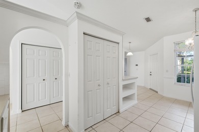 Welcome to easy, low-maintenance living in Guard-gated Jensen on Eagle Marsh Golf Club in Florida - for sale on GolfHomes.com, golf home, golf lot