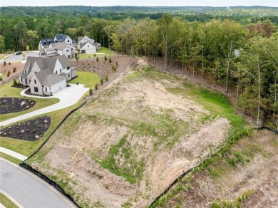 This beautiful cleared lot is located in Governors Towne Club on The Governors Towne Club in Georgia - for sale on GolfHomes.com, golf home, golf lot
