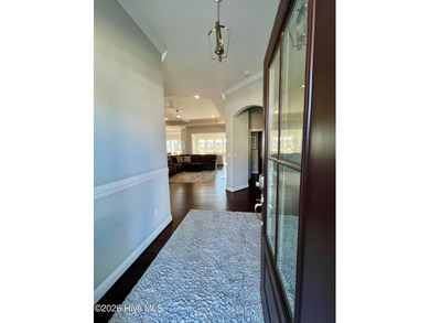 This exceptional residence is located within The Lakes at on Cape Fear National At Brunswick Forest in North Carolina - for sale on GolfHomes.com, golf home, golf lot