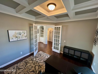 This exceptional residence is located within The Lakes at on Cape Fear National At Brunswick Forest in North Carolina - for sale on GolfHomes.com, golf home, golf lot