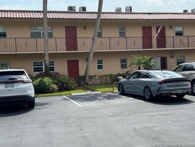 FIRST FLOOR CONDO WITH FANTASTIC VIEWS.   EAST SIDE OF PALM CITY on Monterey Yacht and Country Club in Florida - for sale on GolfHomes.com, golf home, golf lot