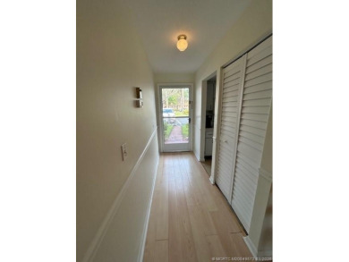 FIRST FLOOR CONDO WITH FANTASTIC VIEWS.   EAST SIDE OF PALM CITY on Monterey Yacht and Country Club in Florida - for sale on GolfHomes.com, golf home, golf lot